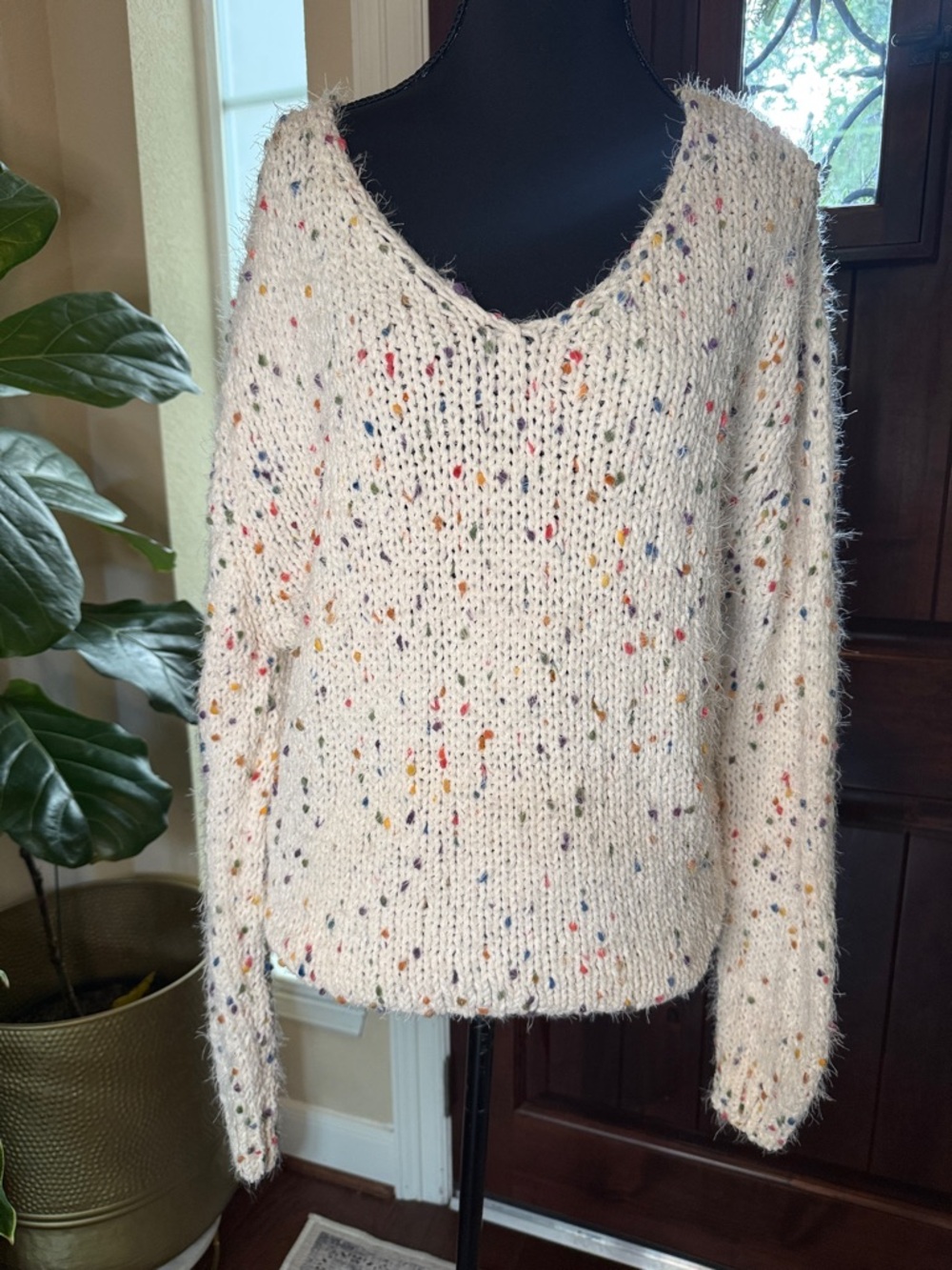 Cozy Cream V-Neck Sweater with Multicolor Speckles